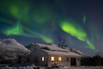 Northern Lights On Snowy Mountain