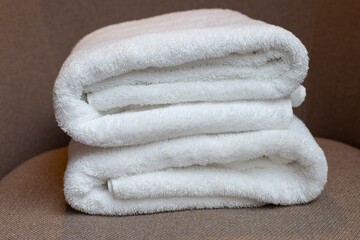 Fototapeta na wymiar Stack of white towels, Bath towel