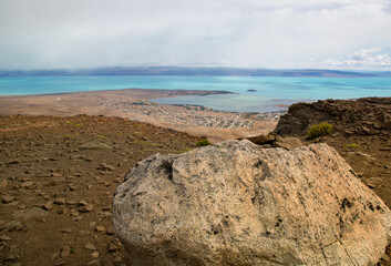 Rock formation and view of Lago Argentino in Patagonia