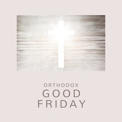 Composite of orthodox good friday text and illuminating cross on wooden table