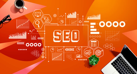 SEO - Search Engine Optimization theme with a laptop computer on a orange pattern background