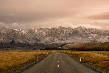 Views of the snow covered mountain range  on the journey back from the alpine Lake Ohau in the remote middle of nowhere