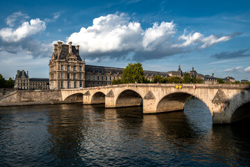 Bridge Pont Royal Over River Seine And Historic Buildings In Paris, France
