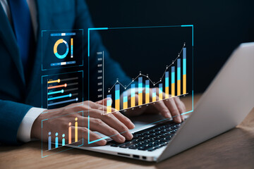 Fototapeta businessman analyzing business Enterprise data management, business analytics with charts, metrics and KPIs to improve organizational performance, marketing, financial organization strategy. obraz