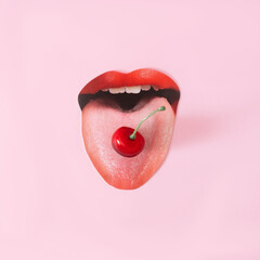 A wide open women's mouth with red lips and a cherry on the tongue. Pink background. Minimal...