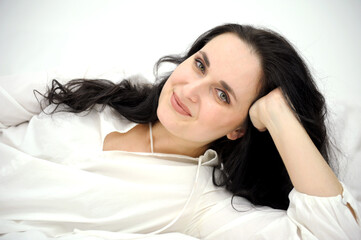 Fototapeta premium young woman 30-40 years old Beautiful gorgeous mature woman looking at camera isolated on white. Mature lady closeup portrait. Beauty healthy facial skin care skin care cosmetics, cosmetology concept