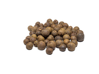 Allspice on a white background. Peppercorn isolate. Seasoning for dishes. Cooking.