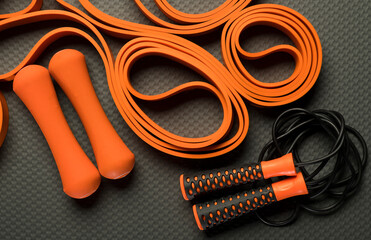 orange fitness background.orange fitness equipment on gray background background for background...