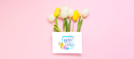 Greeting card with text HAPPY EASTER and tulips on pink background