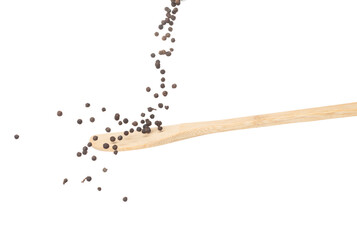 Black Pepper seeds fall down pour on wooden spoon, Black Pepper float explode, abstract cloud fly. Black Peppercorn splash throwing in Air. White background Isolated high speed shutter, freeze motion