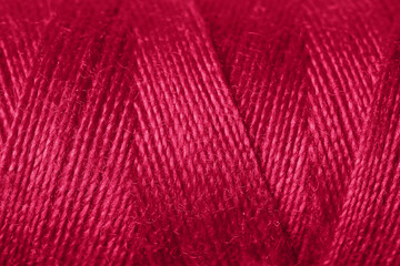 Viva magenta sewing threads, closeup
