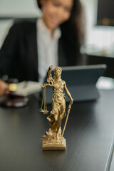 Lawyers Asiawoman   having through online Concepts  of Legal services at the law office.