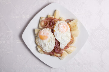 Scrambled eggs with fried yuca chips