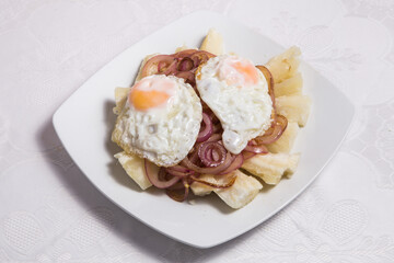 Scrambled eggs with fried yuca chips