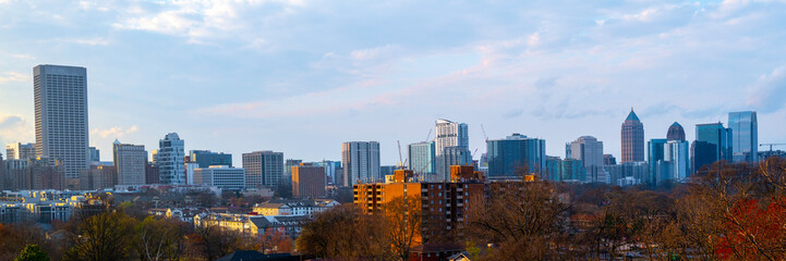Atlanta City Skyline Skyscrapers and Buildings at Cloudy Sunset over the Trees in Georgia
