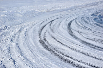 Slippery winter road on a frozen pond. 