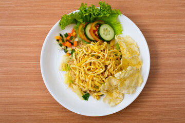 Indonesian Fried Noodles topped with shredded egg on top