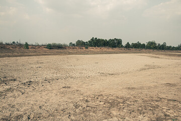 Fototapeta na wymiar Landscape ground cracks drought crisis environment background.