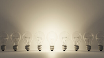 白背景に複数の電球が並ぶ3Dイラスト。1点のみ点灯する電球。アイデア、ひらめきのイメージ。
