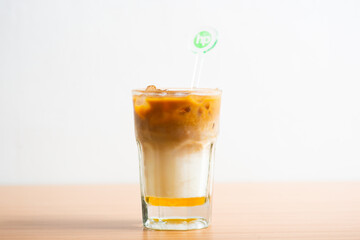 A Cup of iced latte with vanilla syrup