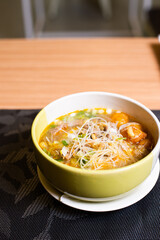 A Plate of Indonesian Dish, Served with Rice Soto Ayam