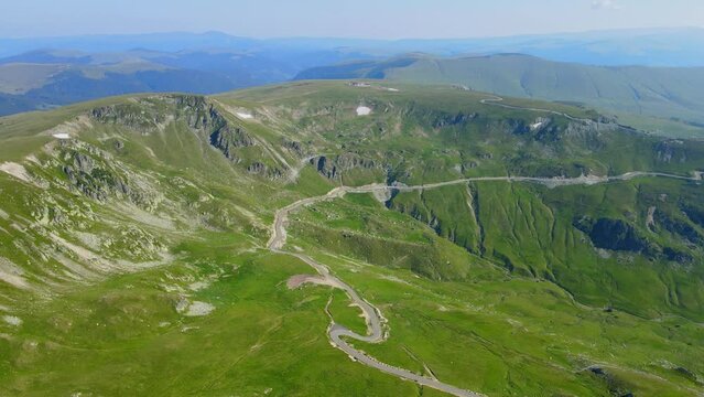 Aerial drone footage of a Romanian mountain road &ndash; Transalpina. It is a 148 km national road located in the Southern Carpathians of Romania and is one of the highest roads of the Carpathian Mountains.