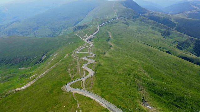 Aerial drone footage of a Romanian mountain road &ndash; Transalpina. It is a 148 km national road located in the Southern Carpathians of Romania and is one of the highest roads of the Carpathian Mountains.