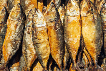 Sun dried mackerel in a food market. Popular food and snack in Asia - obrazy, fototapety, plakaty