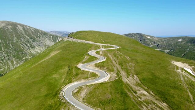 Aerial drone footage of a Romanian mountain road &ndash; Transalpina. It is a 148 km national road located in the Southern Carpathians of Romania and is one of the highest roads of the Carpathian Mountains.