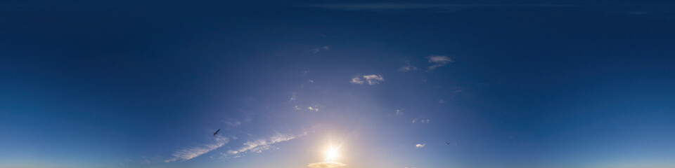 Dark blue sunset sky panorama with Cirrus clouds. Seamless hdr pano in spherical equirectangular format. Complete zenith for 3D visualization, game and sky replacement for aerial drone 360 panoramas.