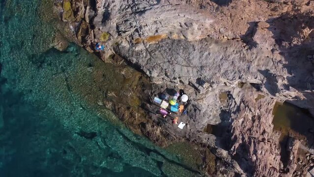 Drone on people on the reef of Calafuria