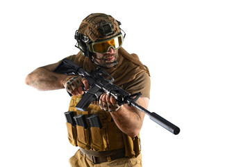 Soldier with an automatic rifle looking to the side, controlling his sector of fire during the withdrawal of his group.
