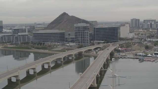 Wide Aerial view of Tempe, Arizona Town Lake and downtown and mountains