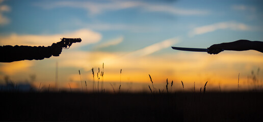 Katana versus revolver fight in the field. Military conflict in Asia. Battle of the big countries....