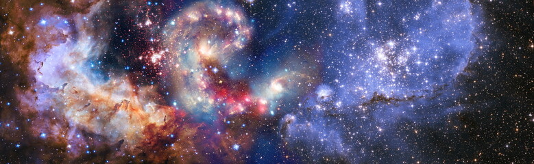 Naklejka na ściany i meble Colorful cosmos with stardust and milky way. Magic color galaxy. Infinite universe and starry night.Elements of this image furnished by NASA
