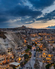 Sunset view of Goreme town and Uchisar castle in Cappadocia, Turkey