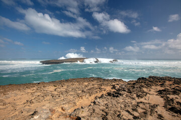 Wave crashing into Laie Point coastline at Kaawa on the North Shore of Oahu Hawaii United States