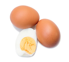 Close up of two boiled chicken eggs with peeled half isolated on white background with clipping path and shadow in png file format, Selective focus photo
