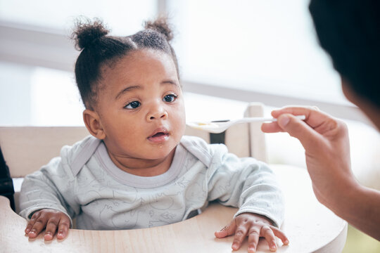 Baby eating deals porridge
