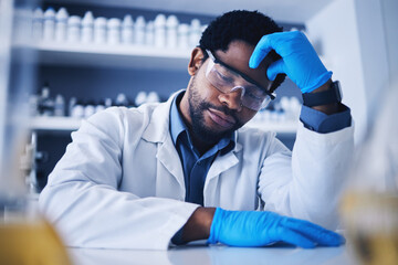 Burnout, stress and scientist black man with a headache during medical research in a lab or...