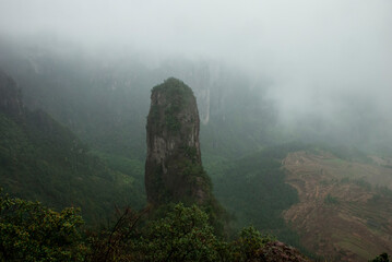 Mountain peak with a very interesting shape in fog