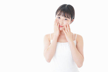 Fototapeta premium 肌のケアをする若い女性