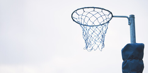 Sports, basketball and netball hoop in a park for fitness and a game at school or in public. Mockup, space and equipment for a sport in the air for playing, competition and professional match - obrazy, fototapety, plakaty