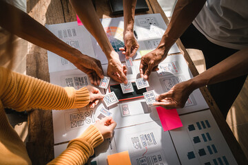 Brainstorm team of creative Web Graphic Designer planning, Group of asia mobile phone app developer...