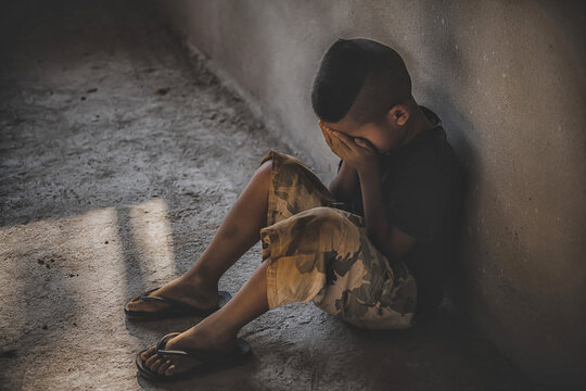Stop abusing boy violence. child bondage , violence, terrified , A fearful child , Human Rights Day concept.