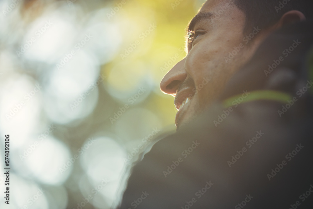 Poster Low angle, face or man hiking in nature forest, trekking woods or trees growth in adventure, relax workout or fitness exercise. Zoom, smile or happy hiker in freedom environment mockup for healthcare