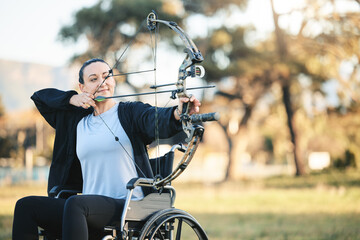 Disabled sports woman, outdoor archery in wheelchair and challenge with active lifestyle in Canada. Person with disability in a park, fitness activity to exercise arms and aim arrow for hobby
