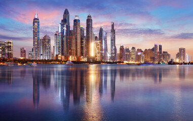 Dubai panorama skyline at dramatic sunset in Marina, United Arab Emirates - obrazy, fototapety, plakaty