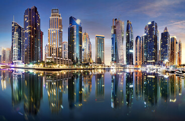 Dubai city skyline panorama at sunset, UAE marina travel photo. Dubai Business Bay skyline