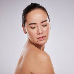 Beauty, skincare and face of a woman in studio for cosmetics, dermatology and makeup for skin glow....